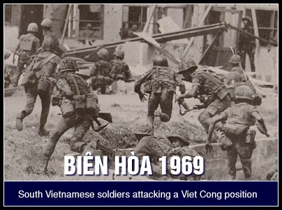 South Vietnamese soldiers attacking a VC position in Bien Hoa, 1969.